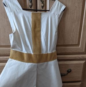 Beige and gold peplum style dress